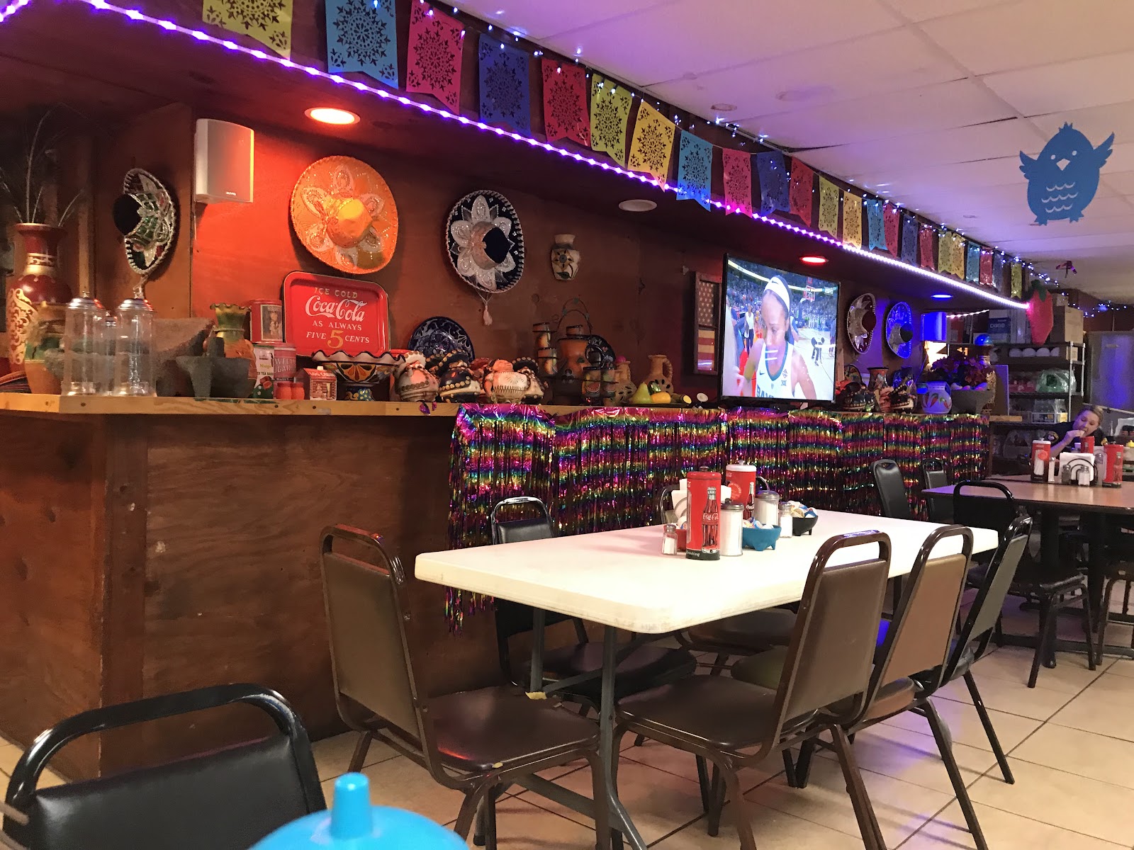 Colorful dining room interior at L & S Mexican Restaurant