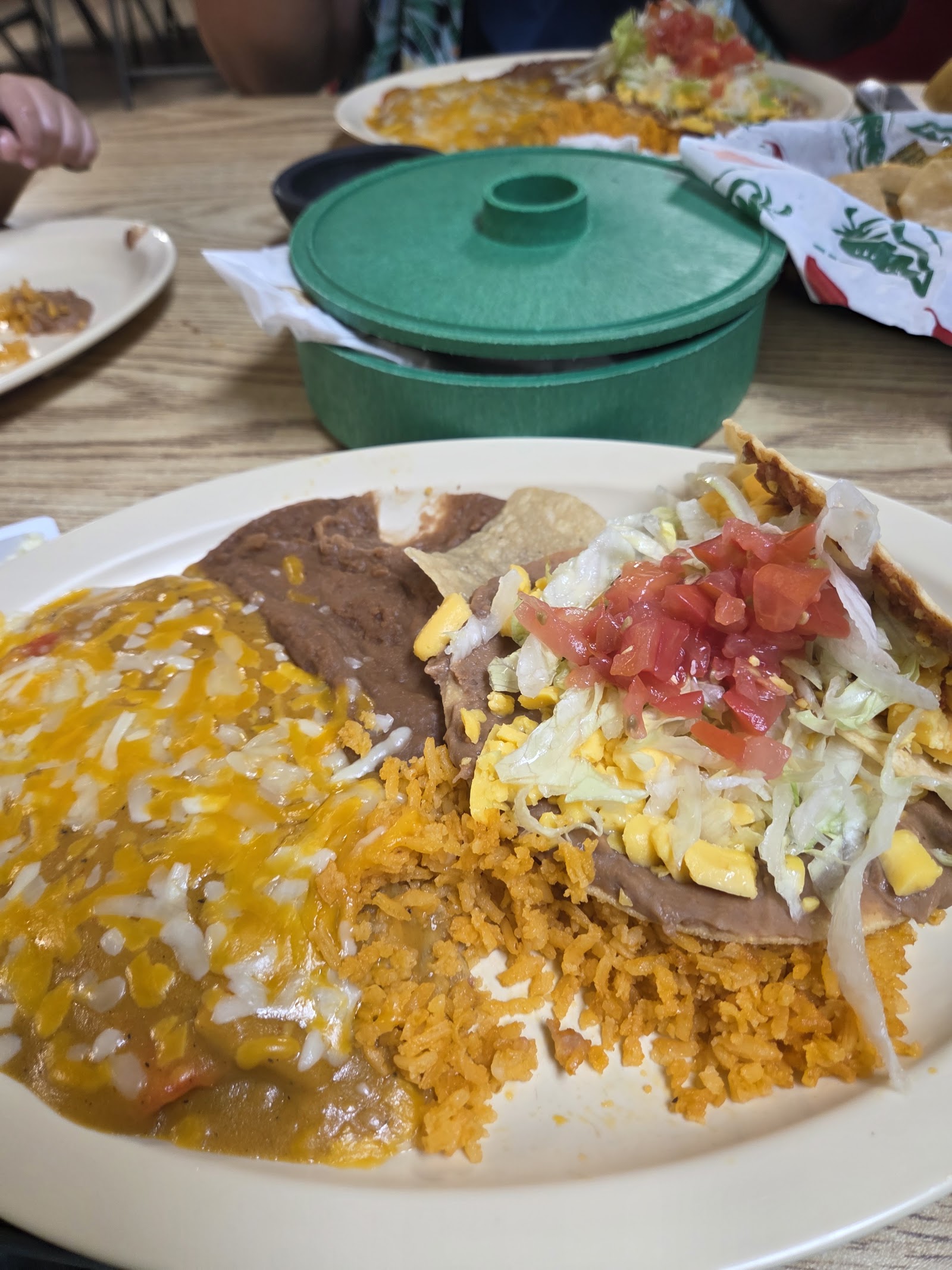 Enchilada plate with rice, beans and a fresh chalupa at L & S Mexican Restaurant